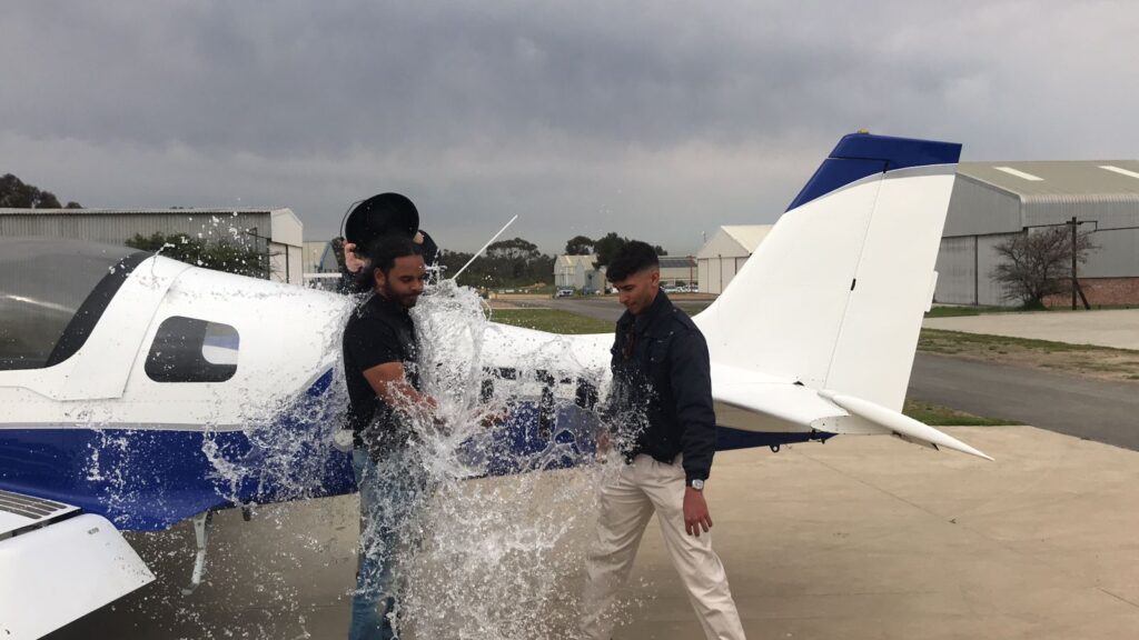 Student milestone celebration at the airfield